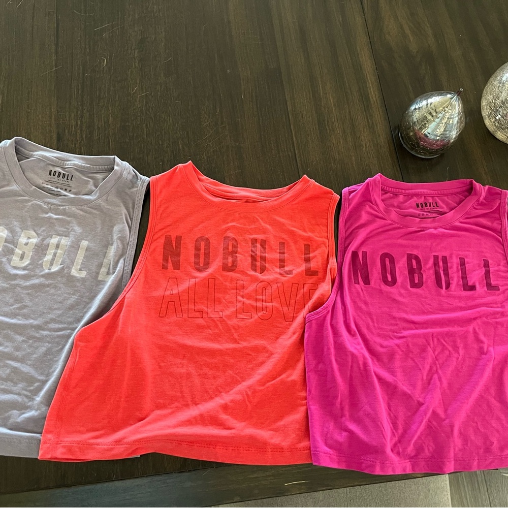 NOBULL Sleeveless Tops in Gray, Red, and Pink